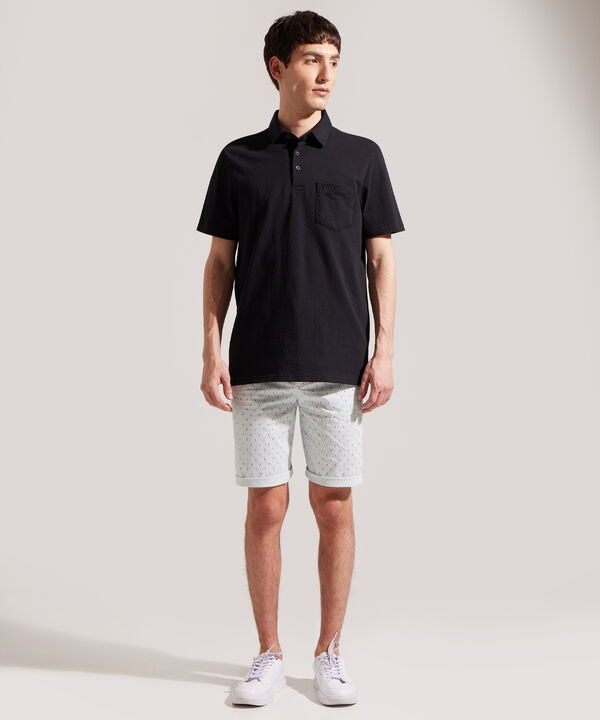 Polo Unicolor Textura Cuello Duro Con Bolsillo Y Silueta Regular Fit, Linea Moda Morocco