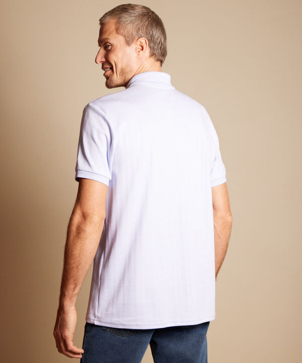 Polo Unicolor Con Textura, Cuello Y Puños Tejidos Sin Bolsillo Y Silueta Regular Fit