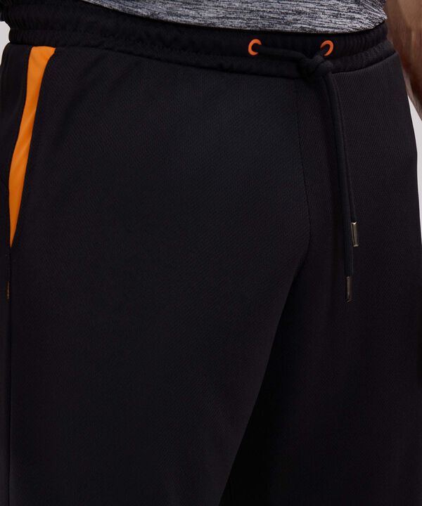 Pantalon Punto Con Cortes En Contraste image number null