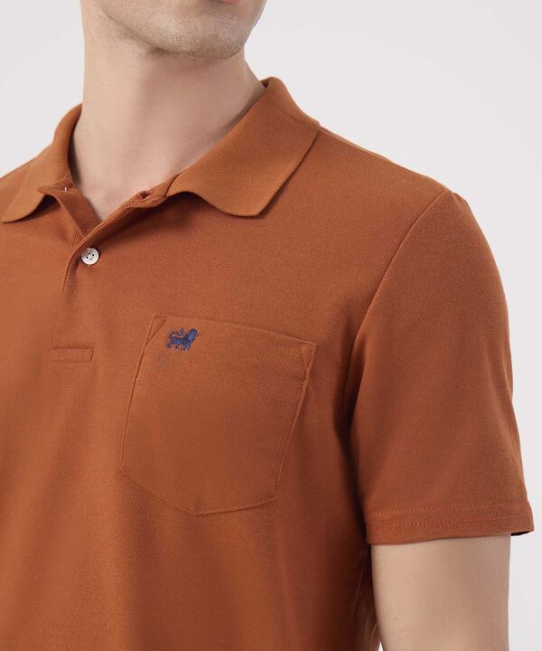 Polo Unicolor Con Bolsillo 