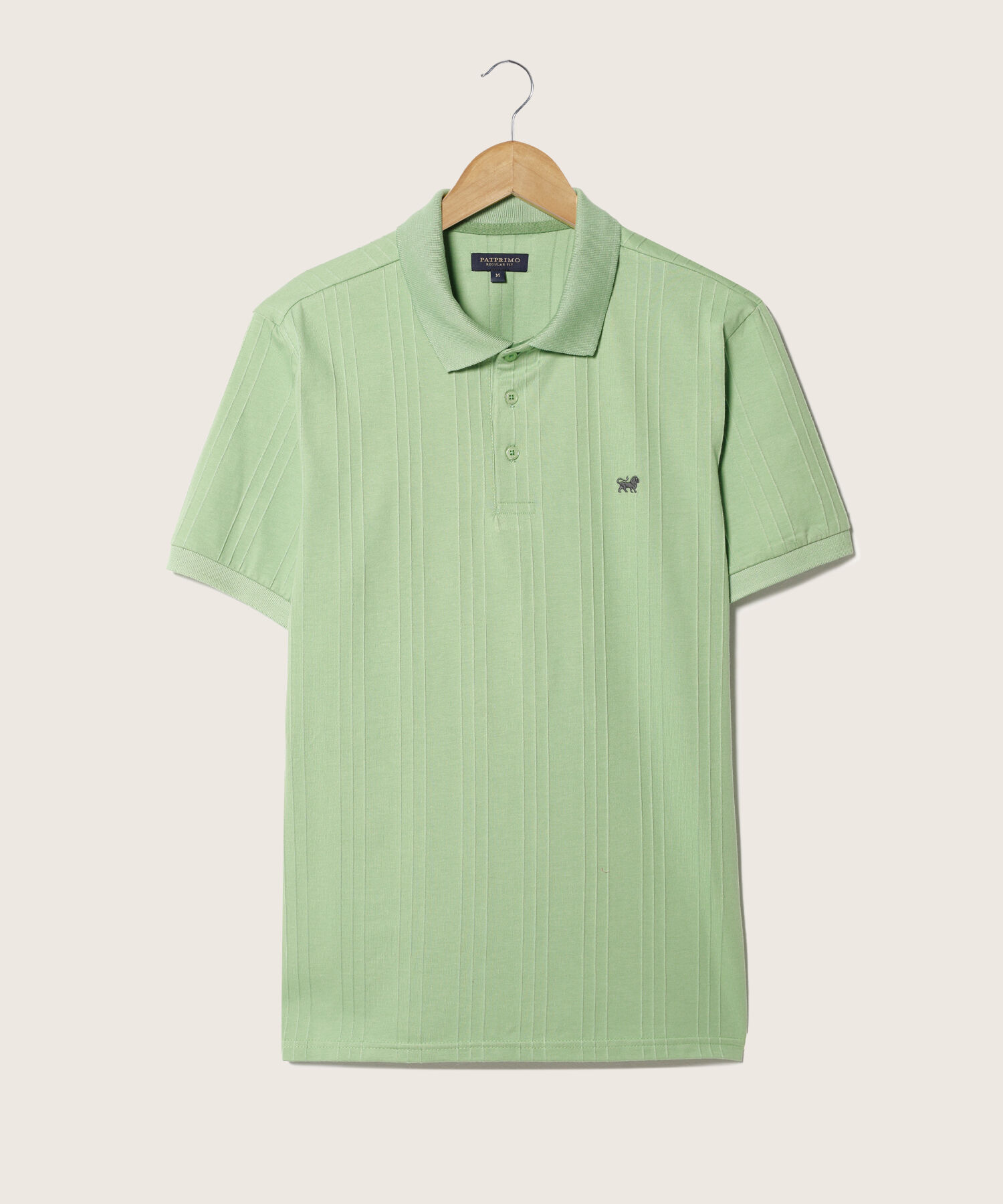 Polo Unicolor Con Textura Cuello Y Pu&ntilde;os Tejidos Sin Bolsillo Con Silueta Regular Fit