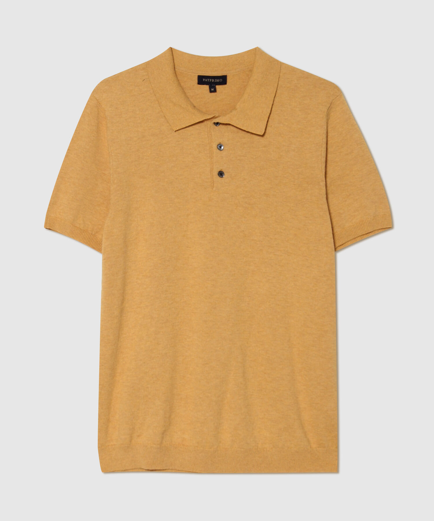 Polo Unicolor Cuello Y Puños En Rib