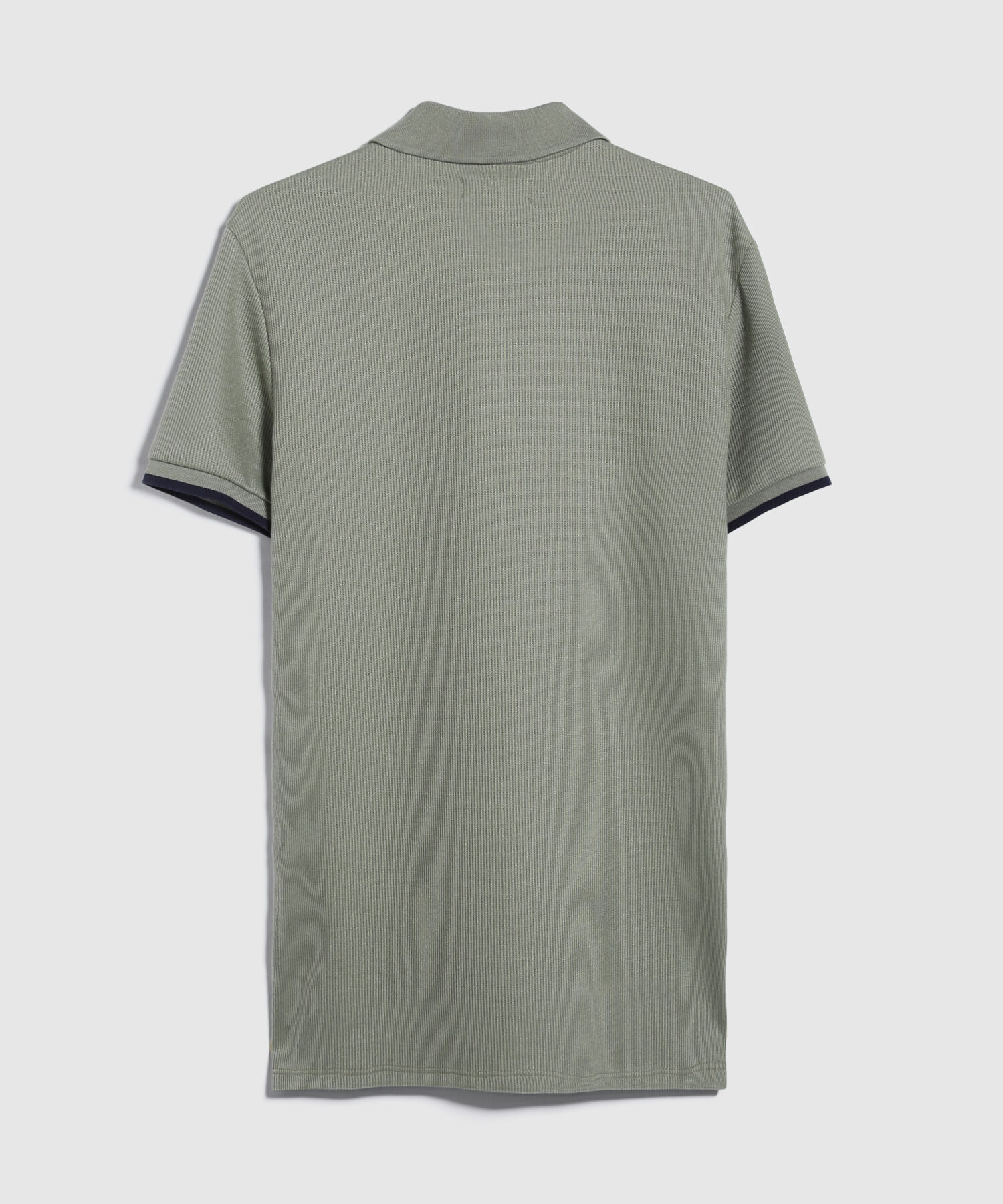 Polo Unicolor Pechera Tejida