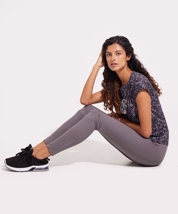 Leggings Largo Tiro Alto Con Pretina Delgada Unicolor Con Reflectivos En Botas image number null