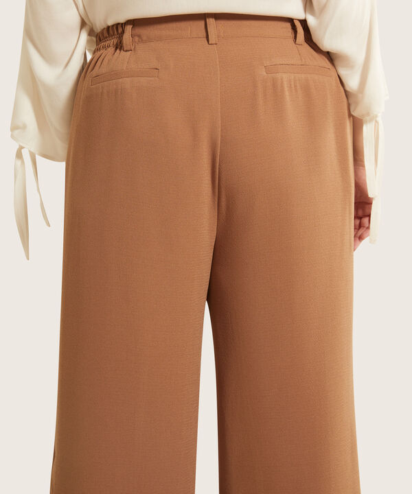 Pantalón Palazzo Con Botones En Bota
