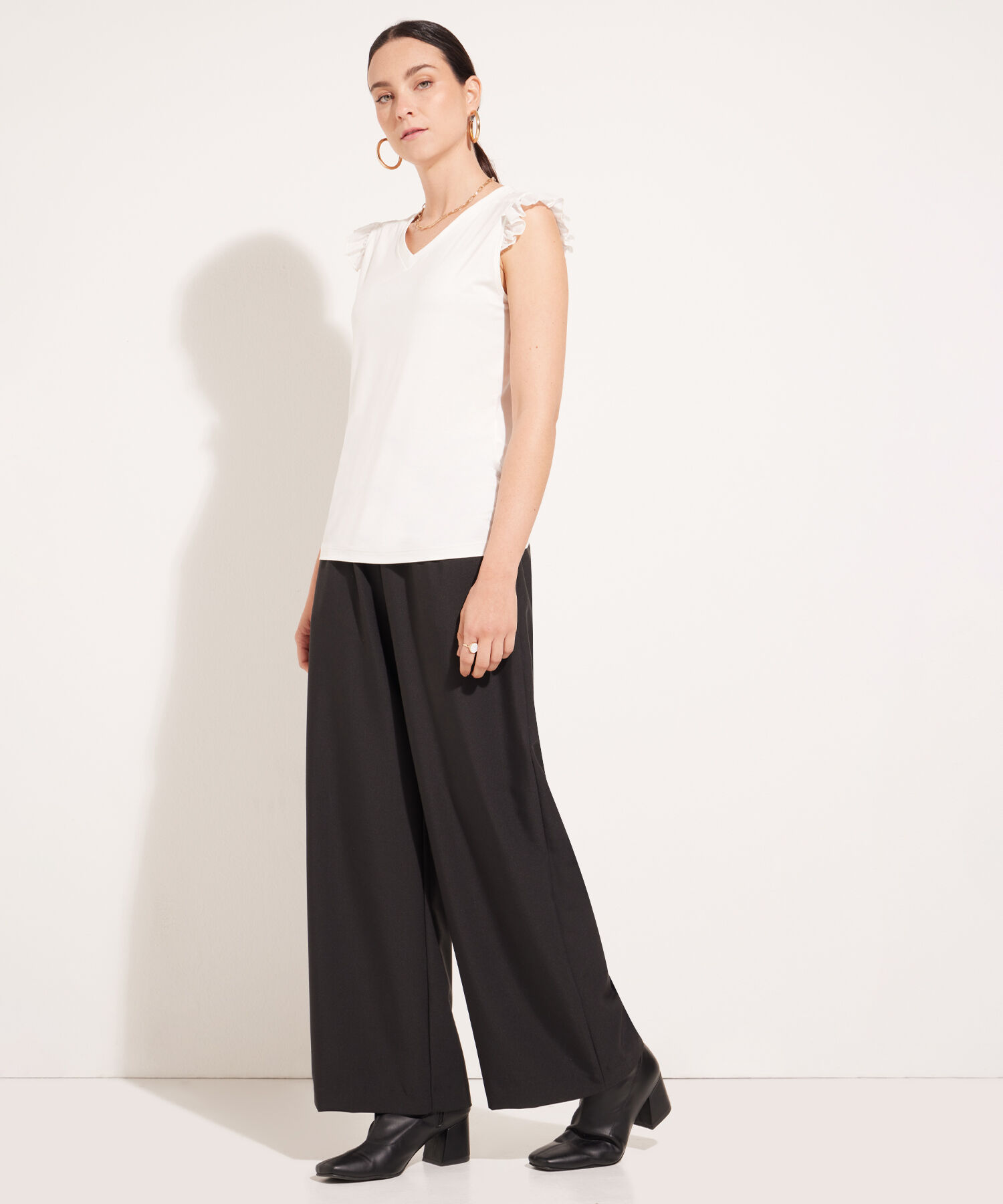 Pantalón Unicolor Con Prense En Frente