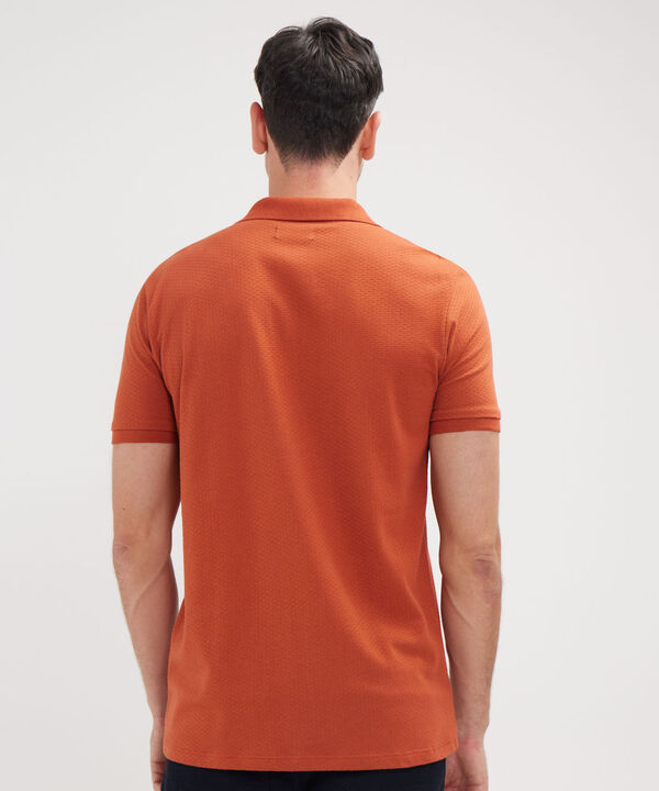 Polo Unicolor Cuello Y Puños Tejidos