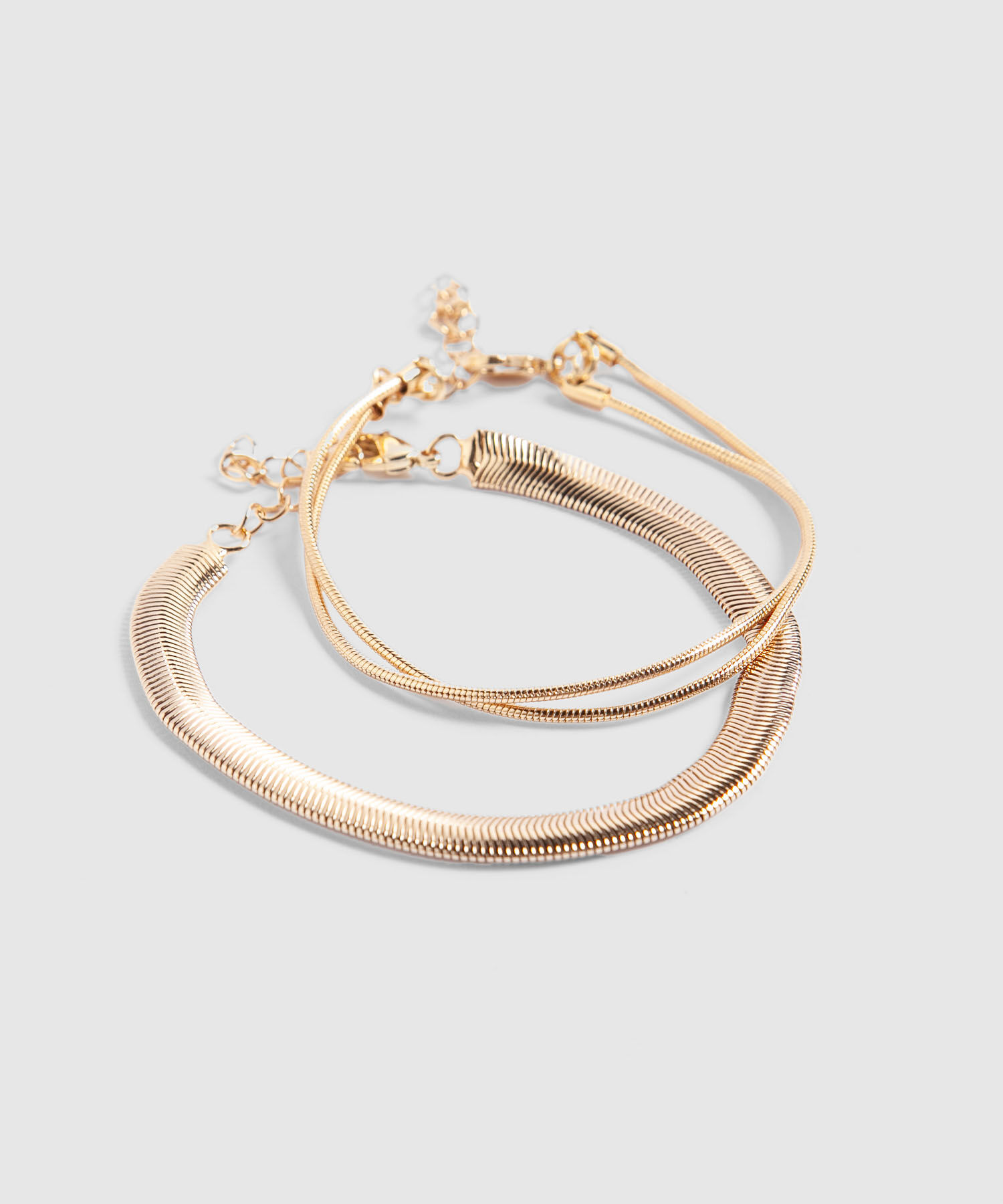 Set x 2 Pulseras Doradas