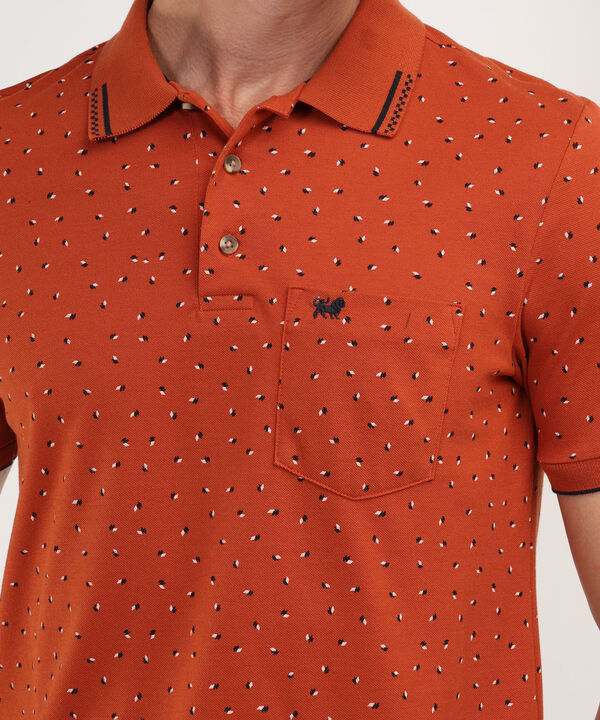Polo Estampada, Cuello Y Puños Tejidos Con Bolsillo