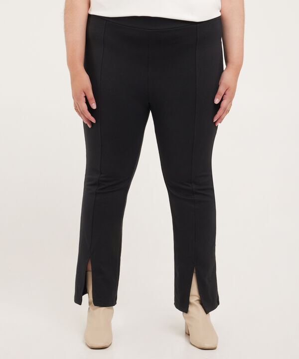 Leggings Unicolor Tipo Flare Con Abertura En Ruedo
