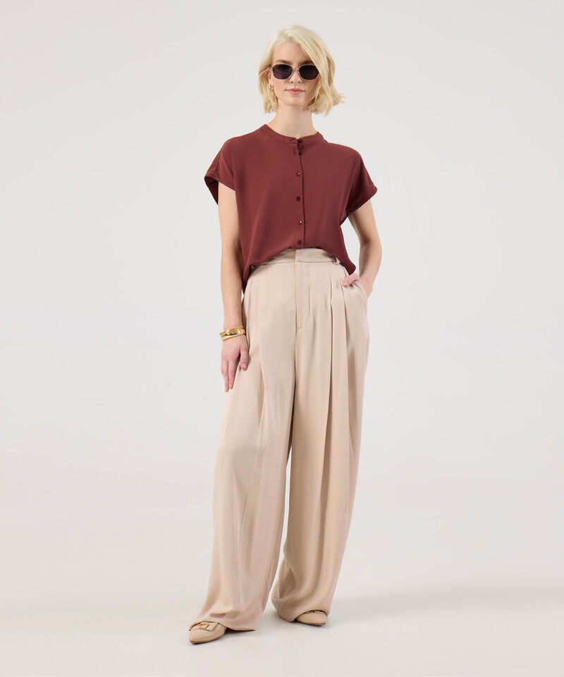 Blusa Unicolor Con Botones A Tono