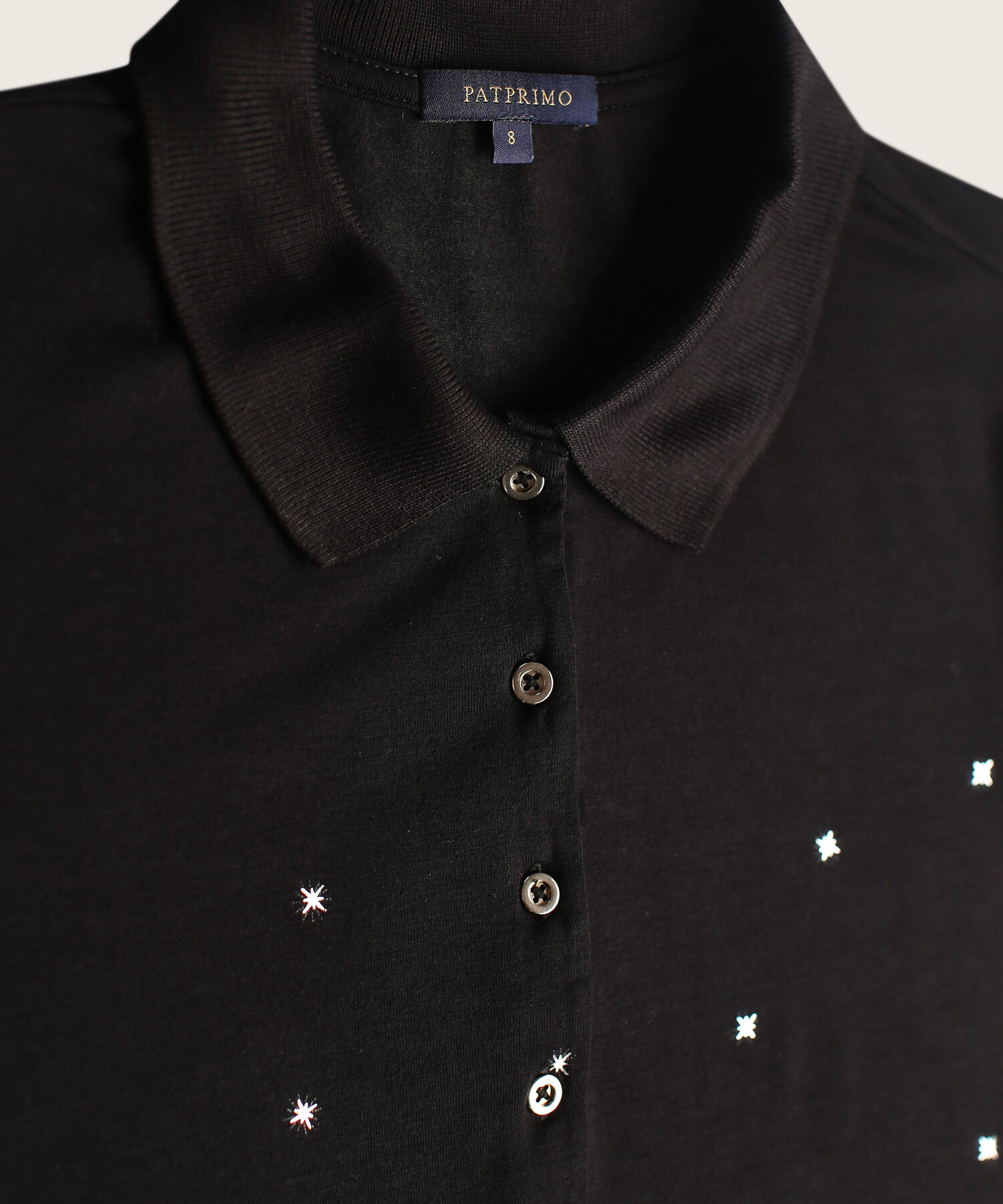 Polo con brillante