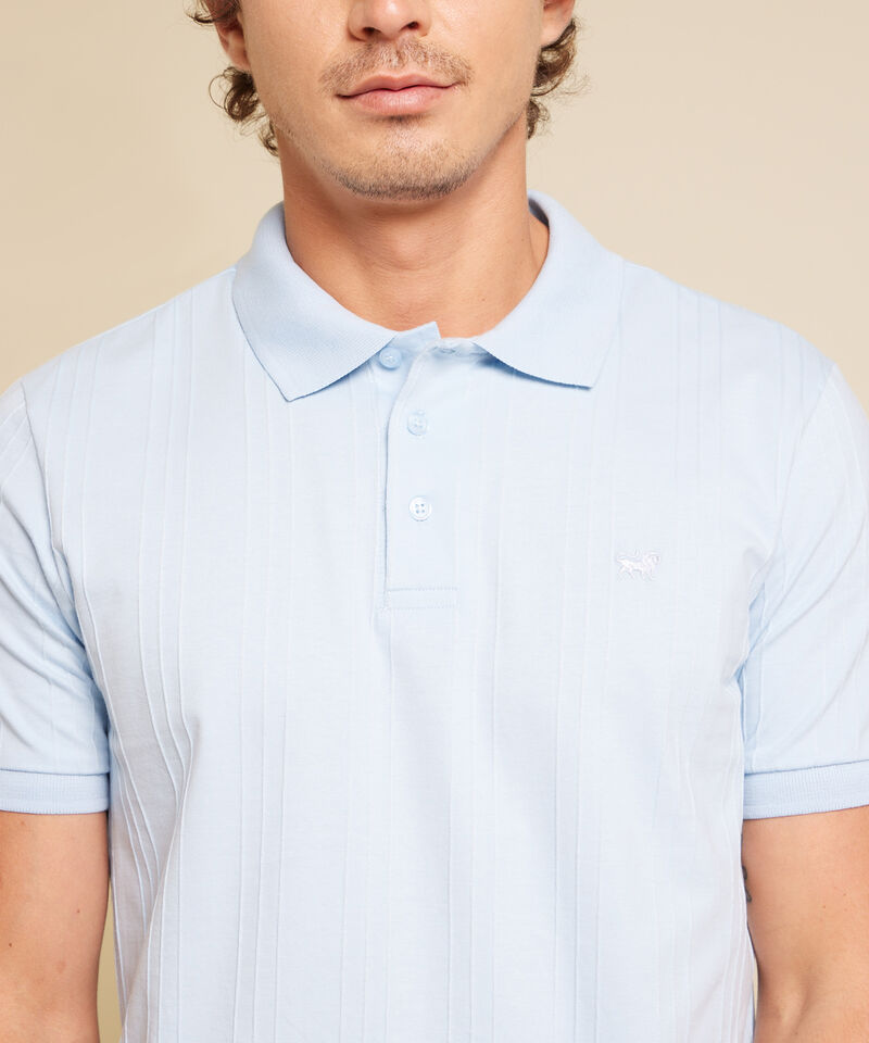 Polo Unicolor Con Textura Cuello Y Pu&ntilde;os Tejidos Sin Bolsillo Con Silueta Regular Fit