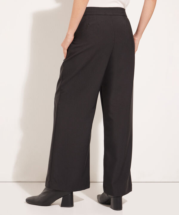 Pantalón Unicolor Con Prense En Frente