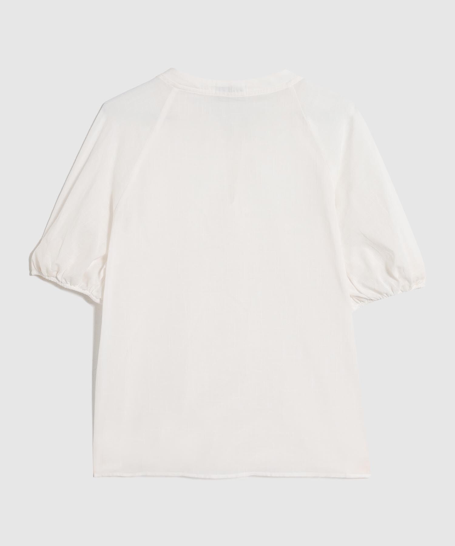 Blusa Unicolor Con Nudo En Cuello 