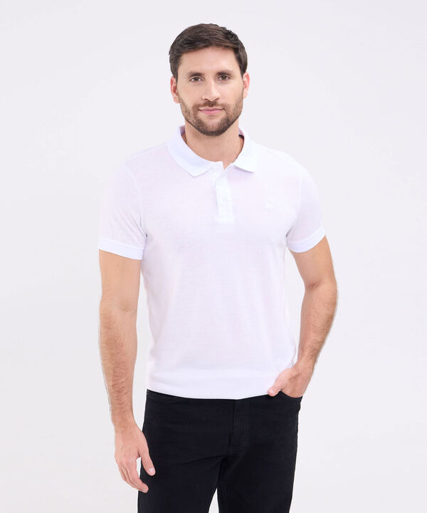 Polo Unicolor Con Textura, Cuello Y Puños Tejidos, Silueta Slim Fit, Lineas image number null