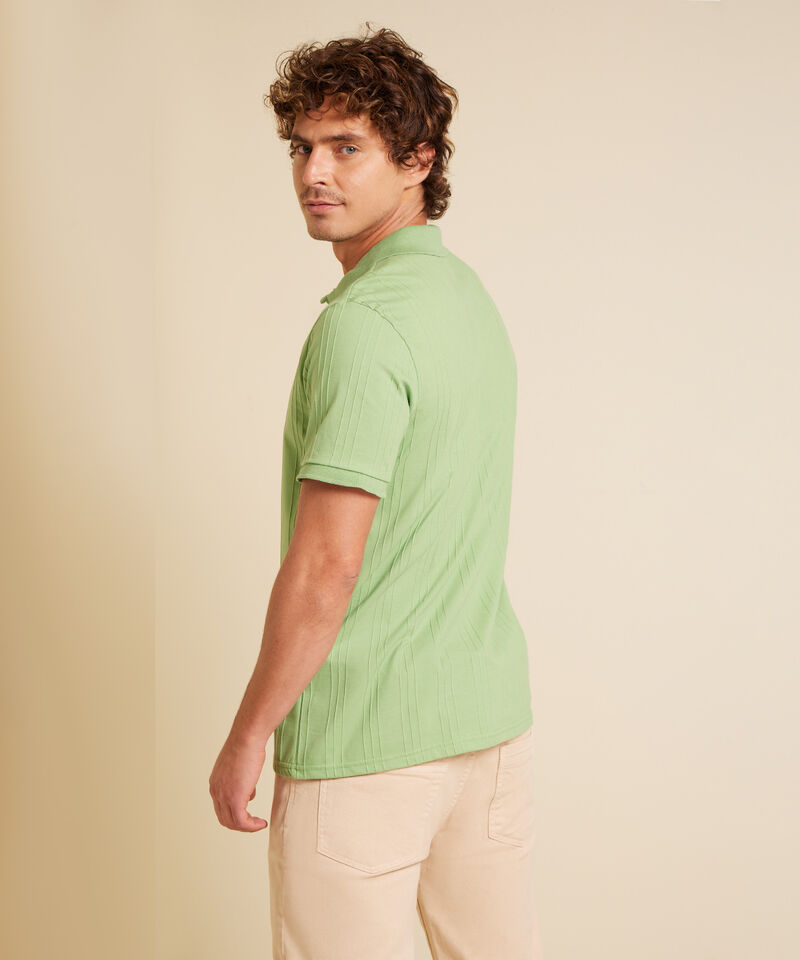 Polo Unicolor Con Textura Cuello Y Pu&ntilde;os Tejidos Sin Bolsillo Con Silueta Regular Fit