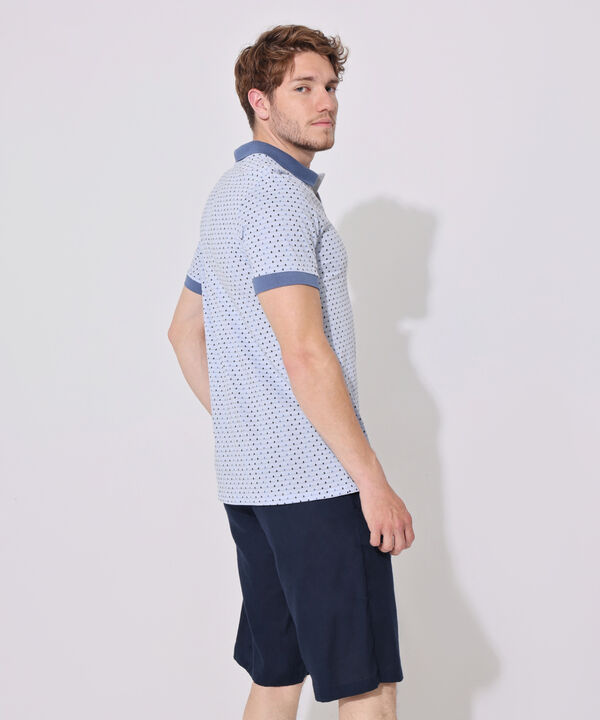 Polo Estampada, Cuello Y Puños Tejidos En Contraste Con Bolsillo, Silueta Regular Fit