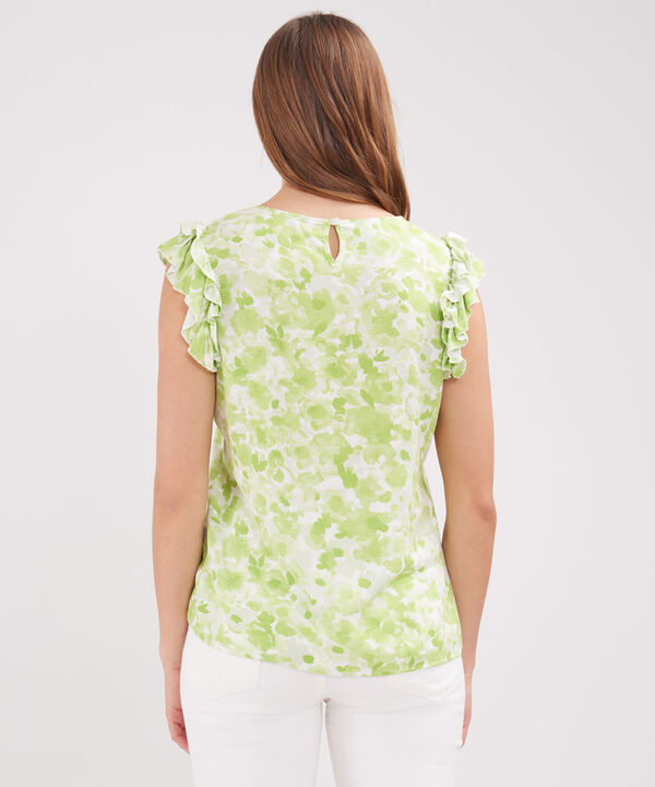 Blusa Estampada Con Boleros En Mangas