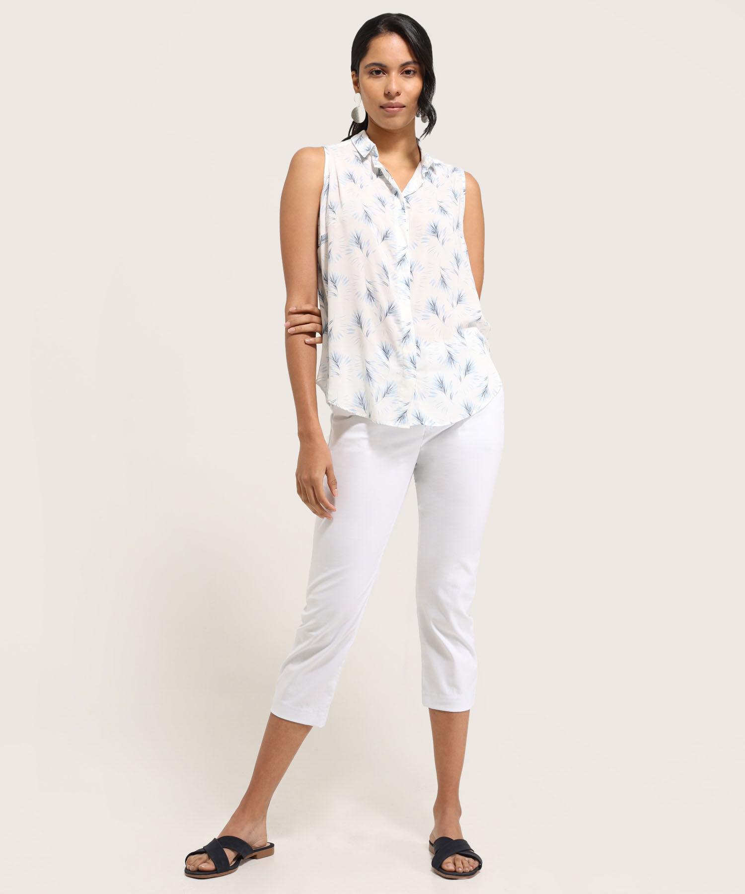 Pantalon Capri Bolsillos