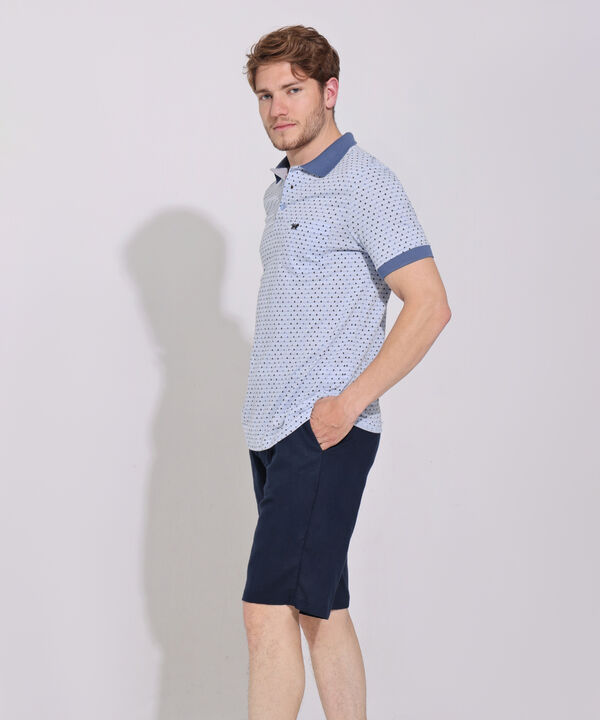 Polo Estampada, Cuello Y Puños Tejidos En Contraste Con Bolsillo, Silueta Regular Fit