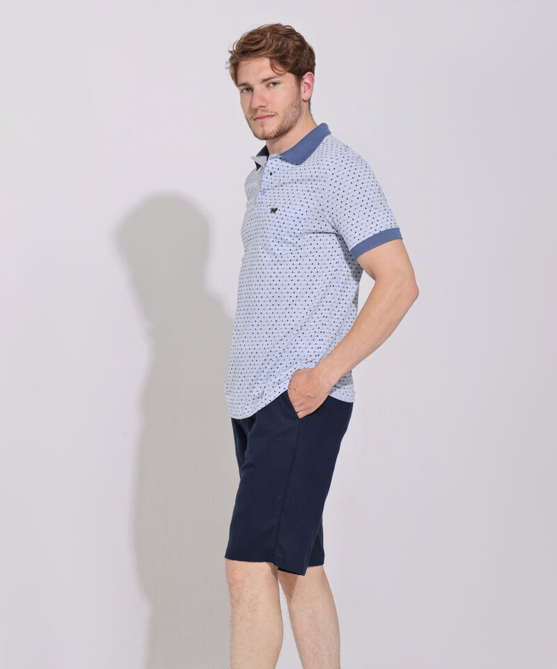 Polo Estampada, Cuello Y Puños Tejidos En Contraste Con Bolsillo, Silueta Regular Fit