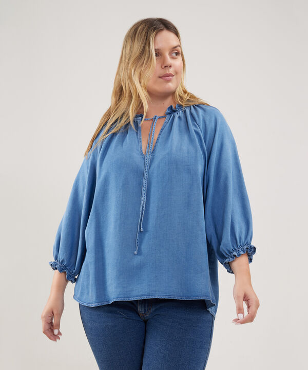 Blusa Tono Azul Medio Claro Con Elastico En Puños Y Cordón En Tela Cuerpo