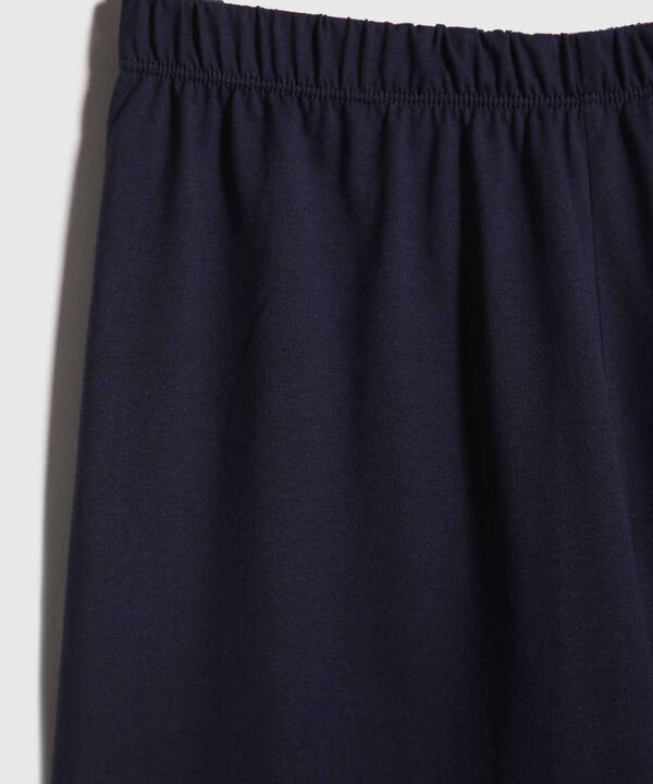 Pijama Junior Camiseta M/C Cuello Redondo/Pantaloneta Unicolor - Lineas