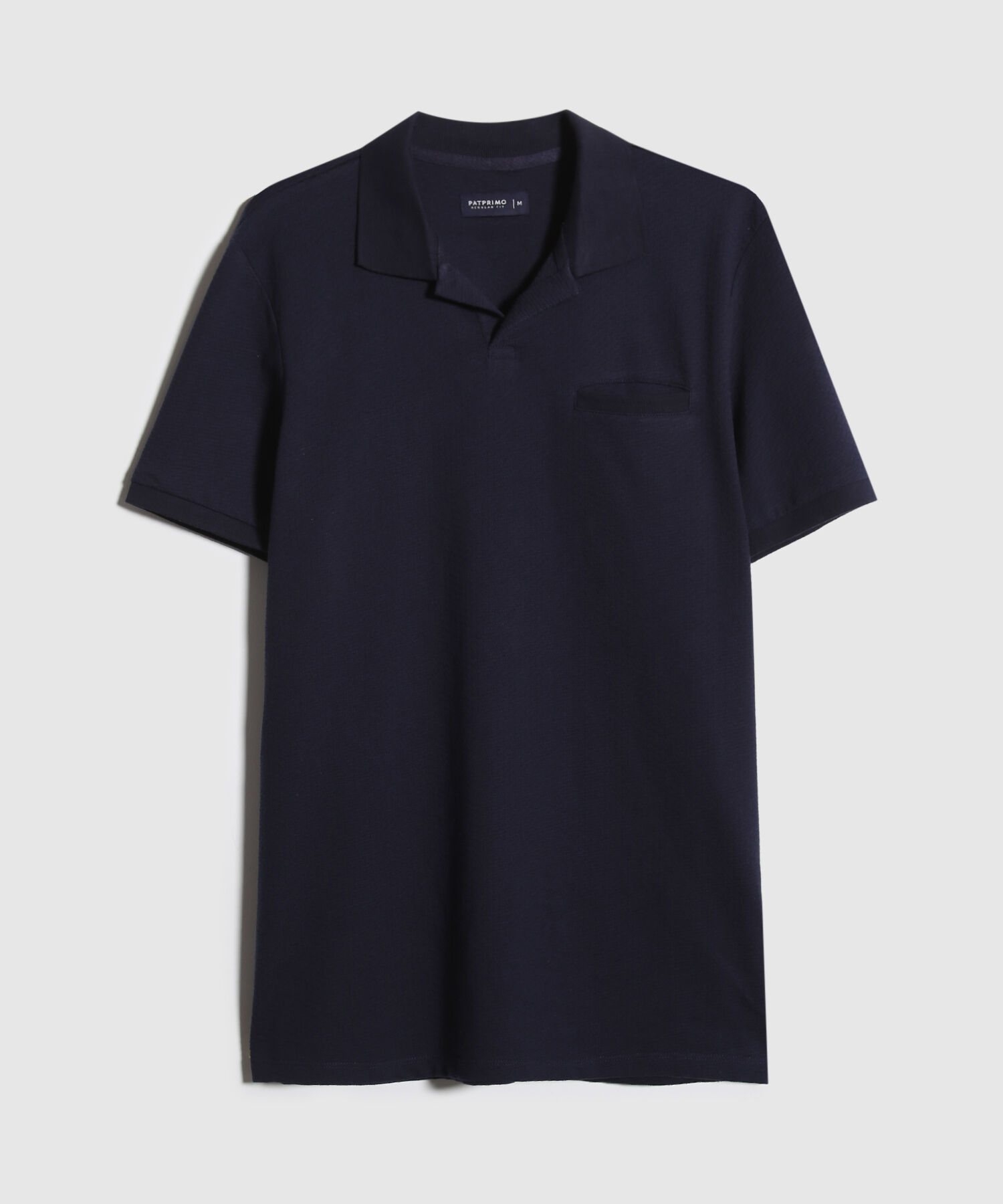 Polo Unicolor Cuello Y Puños Tejidos