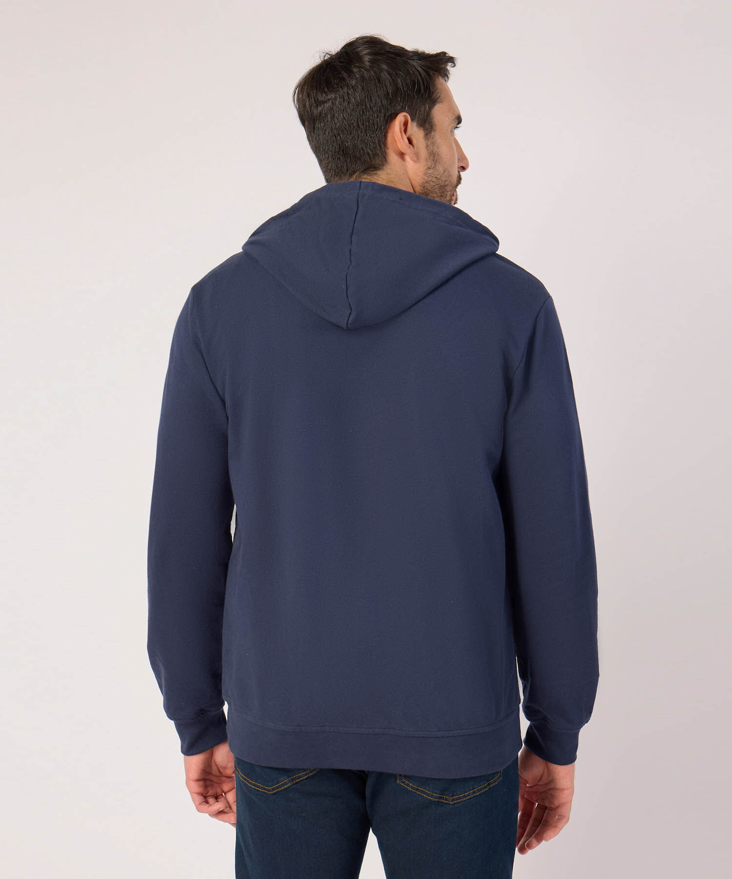 Buzo Unicolor Con Bordado En Costado 