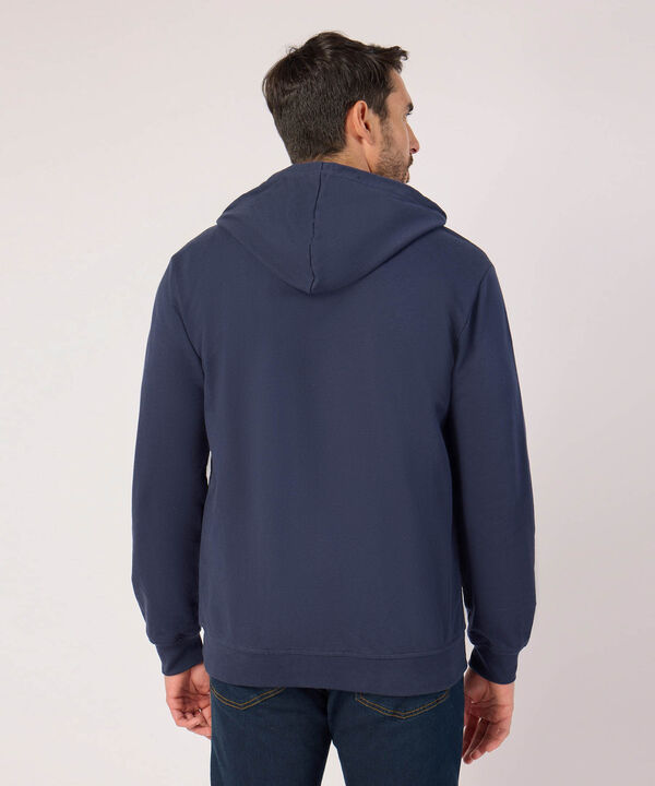 Buzo Unicolor Con Bordado En Costado 