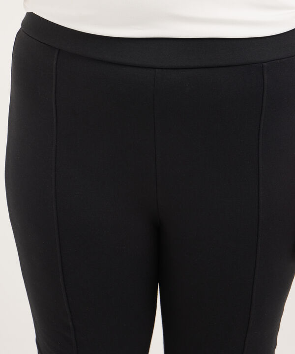Leggings Unicolor Tipo Flare Con Abertura En Ruedo