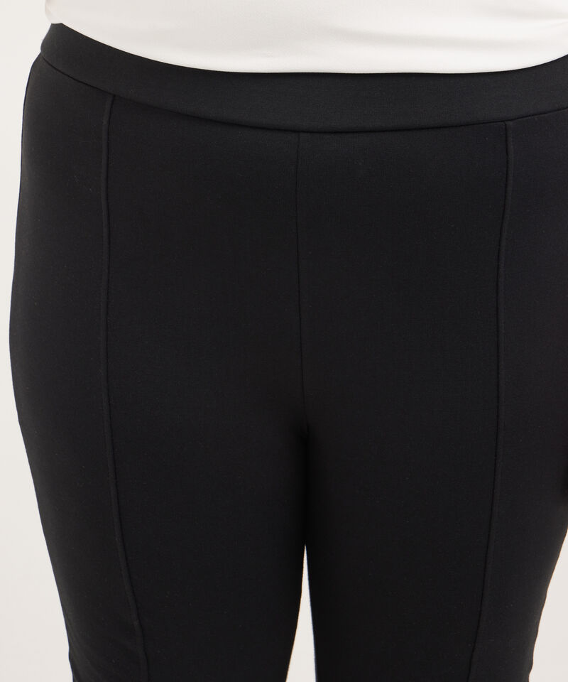 Leggings Unicolor Tipo Flare Con Abertura En Ruedo