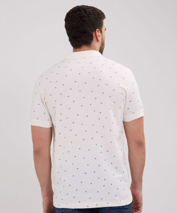 Polo Estampada Cuello Y Puños Tejidos Con Bolsillo