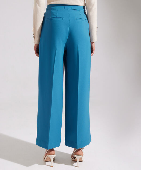 Pantalón Con Prenses  Bota Amplia Crudo