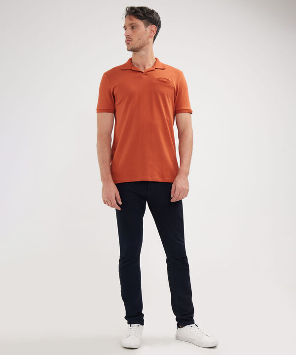 Polo Unicolor Cuello Y Puños Tejidos image number null