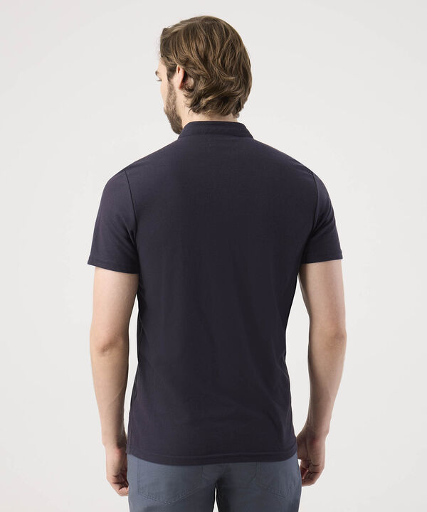 Polo Unicolor Con Bordado