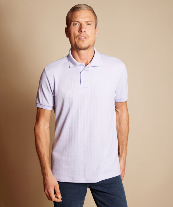 Polo Unicolor Con Textura, Cuello Y Puños Tejidos Sin Bolsillo Y Silueta Regular Fit