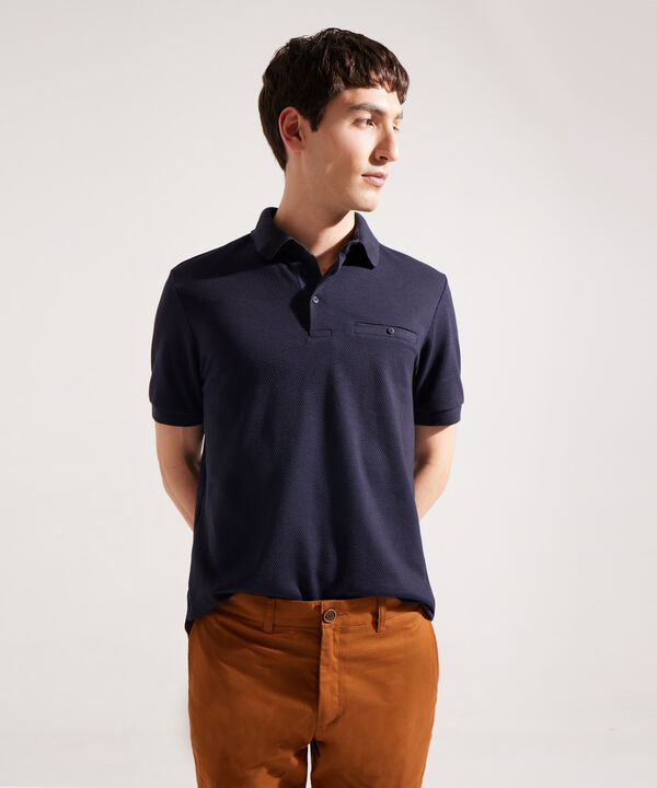Polo Unicolor Regular Con Bolsillo De Ribete Tejido image number null