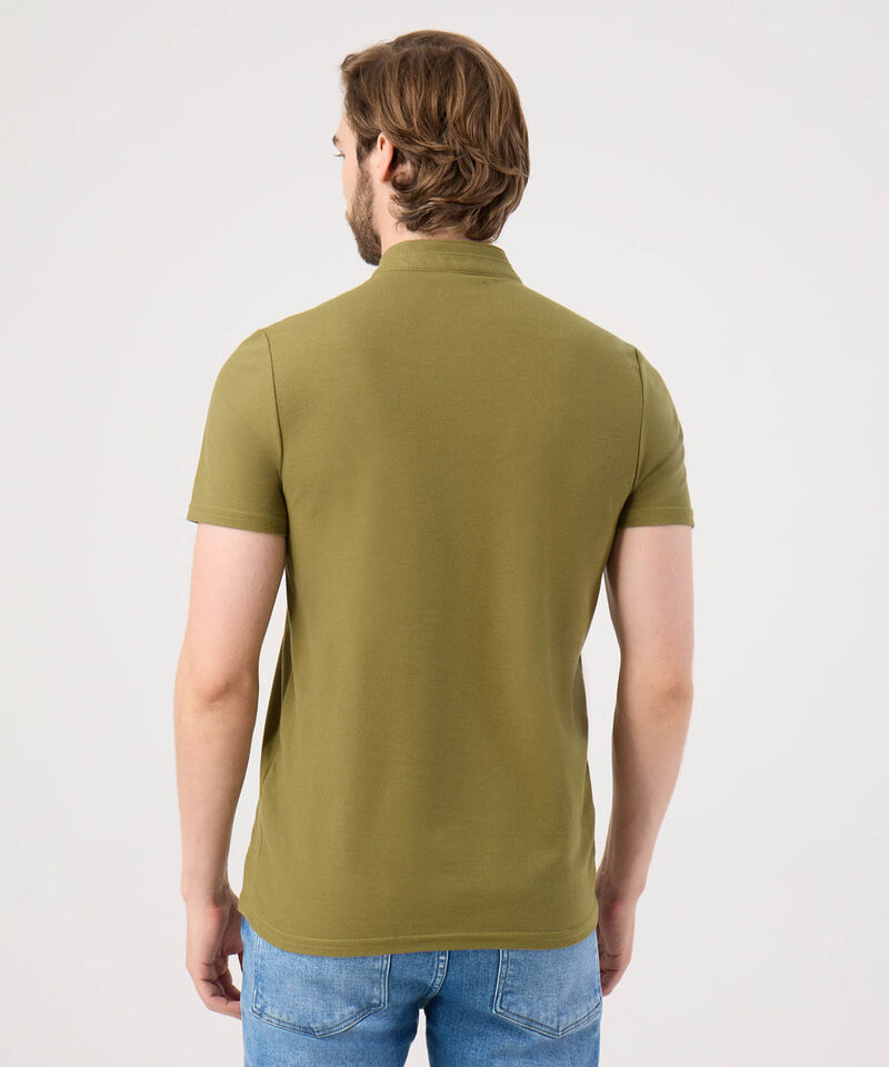 Polo Unicolor Con Bordado