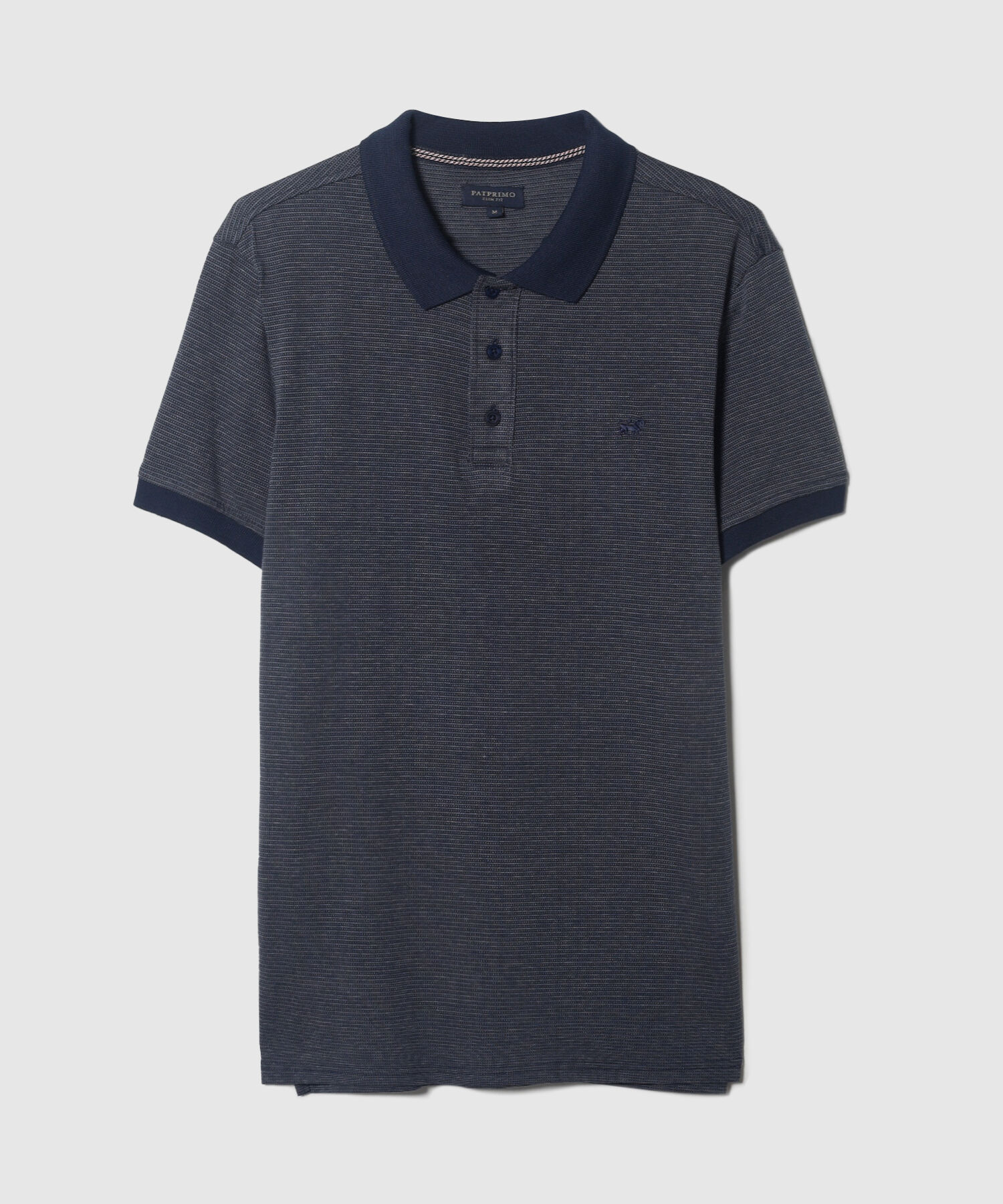 Polo Unicolor Con Textura, Cuello Y Puños Tejidos, Silueta Slim Fit, Lineas