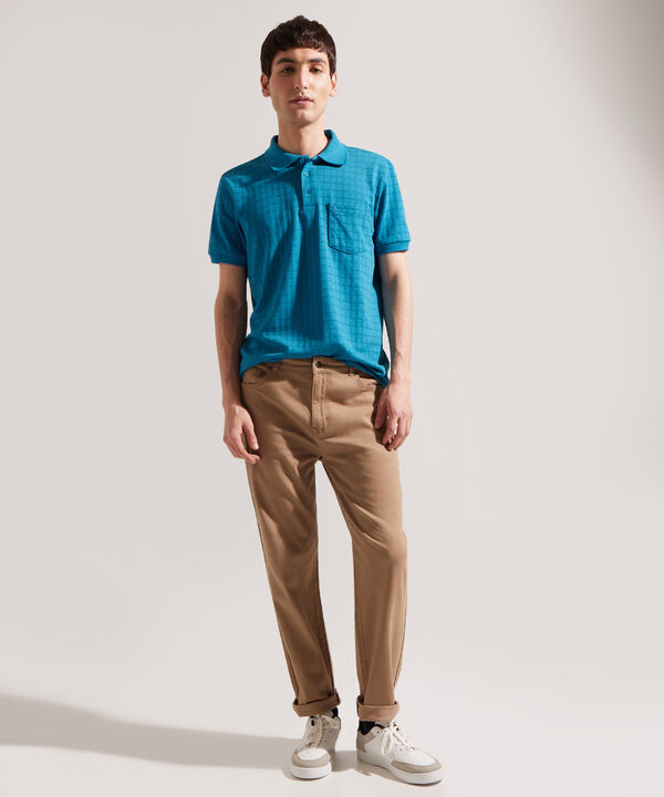 Polo Cuello Y Puño Tejido Unicolor, Con Bolsillo