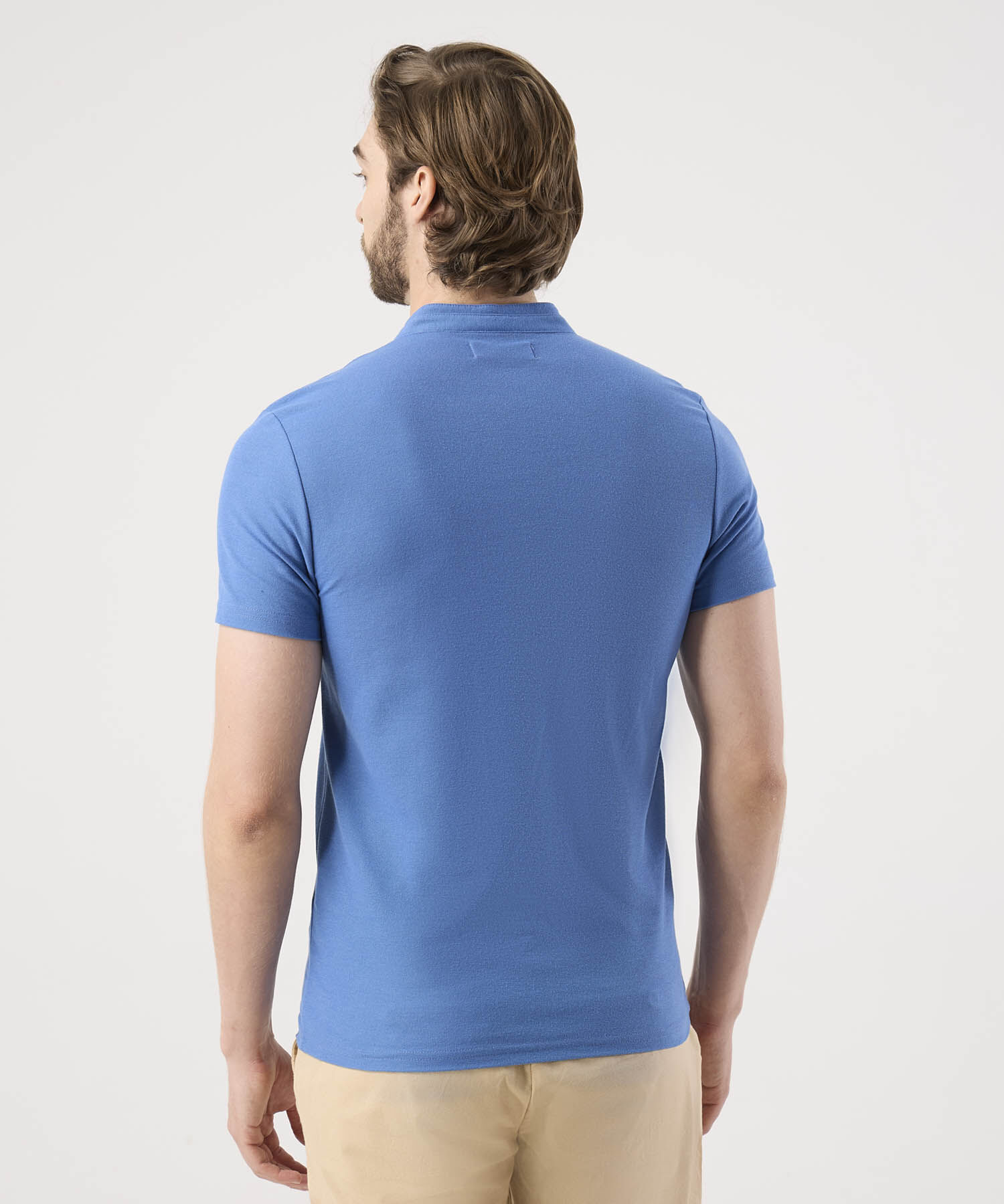 Polo Unicolor Con Bordado