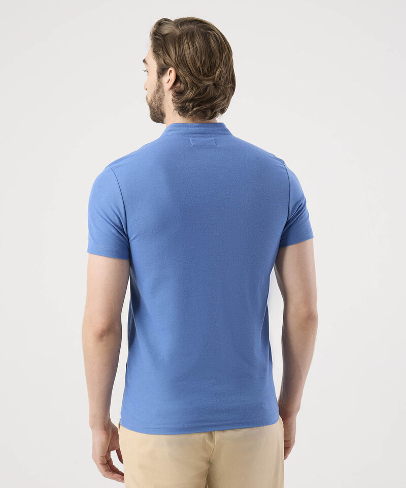 Polo Unicolor Con Bordado