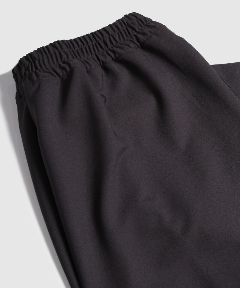 Pantalón Unicolor Con Bolsillos Laterales