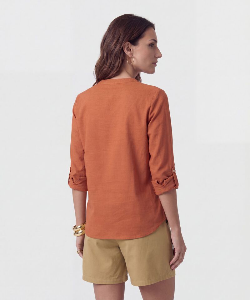 Blusa Fluida Con Bolsillos Frontales