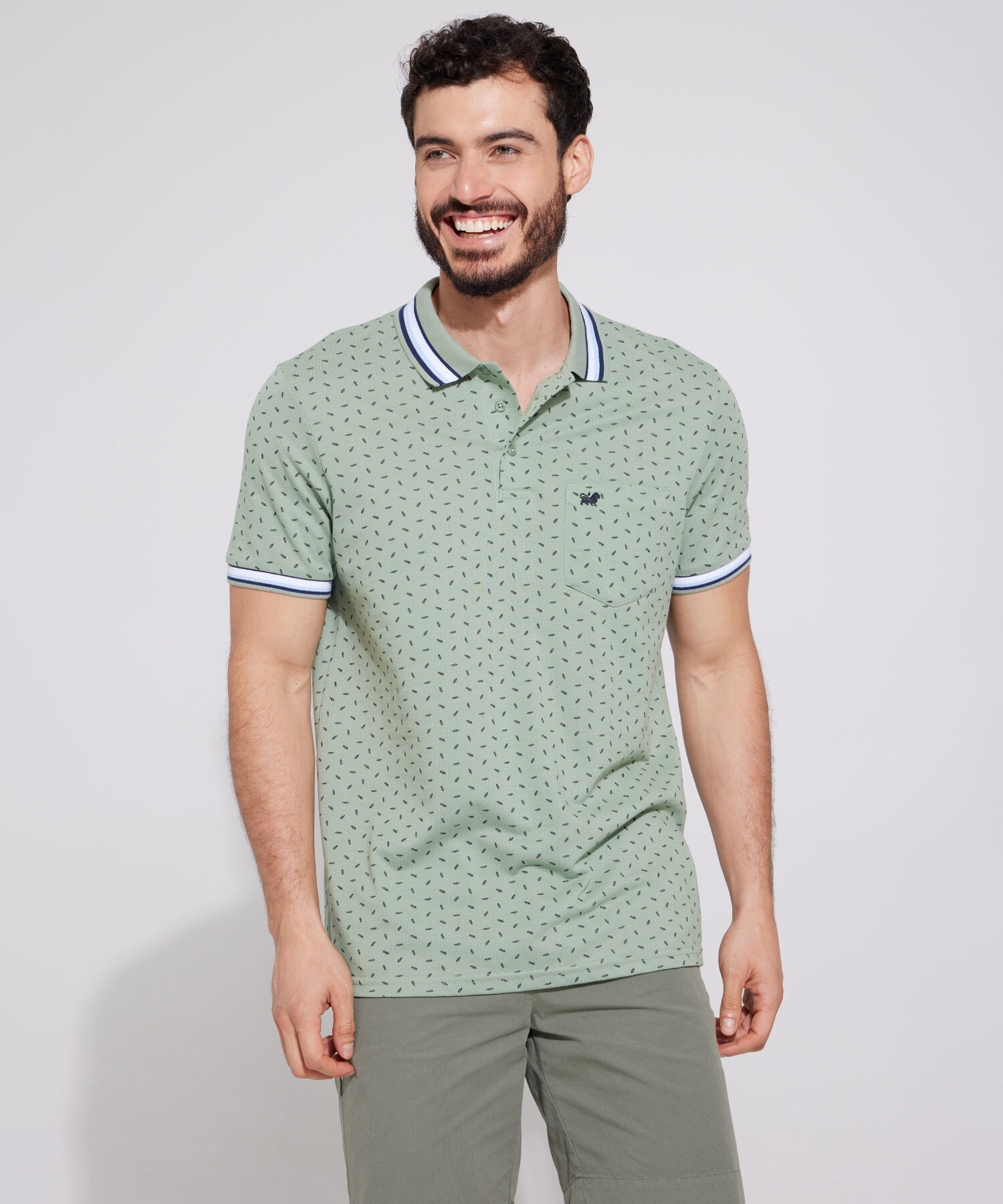 Polo Estampada, Cuello Y Puños Tejidos Con Bolsillo, Silueta Regular Fit