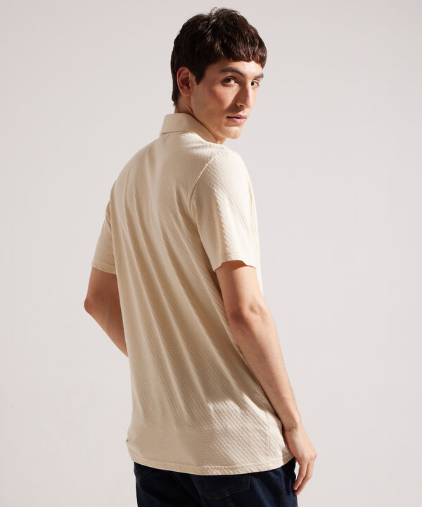 Polo Unicolor Textura Cuello Duro Con Bolsillo Y Silueta Regular Fit, Linea Moda Morocco image number null