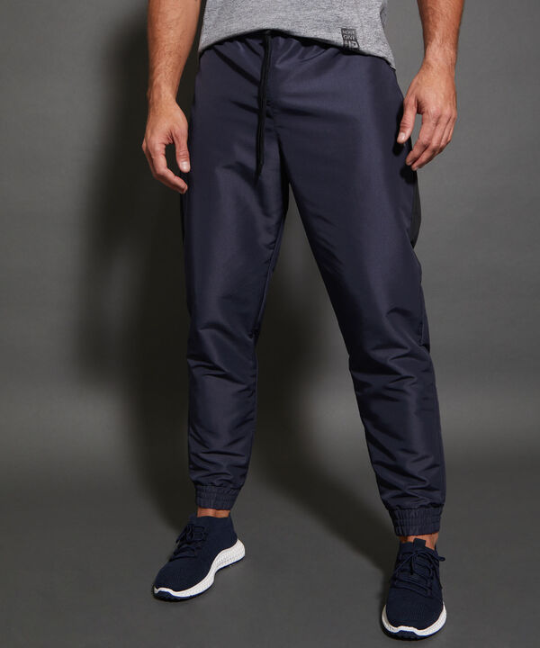 Pantalón Jogger Plano Unicolor Con Cortes Contraste, Bolsillos Laterales, Cordón Ajustable Y Elástico Interno, Sport Líneas image number null