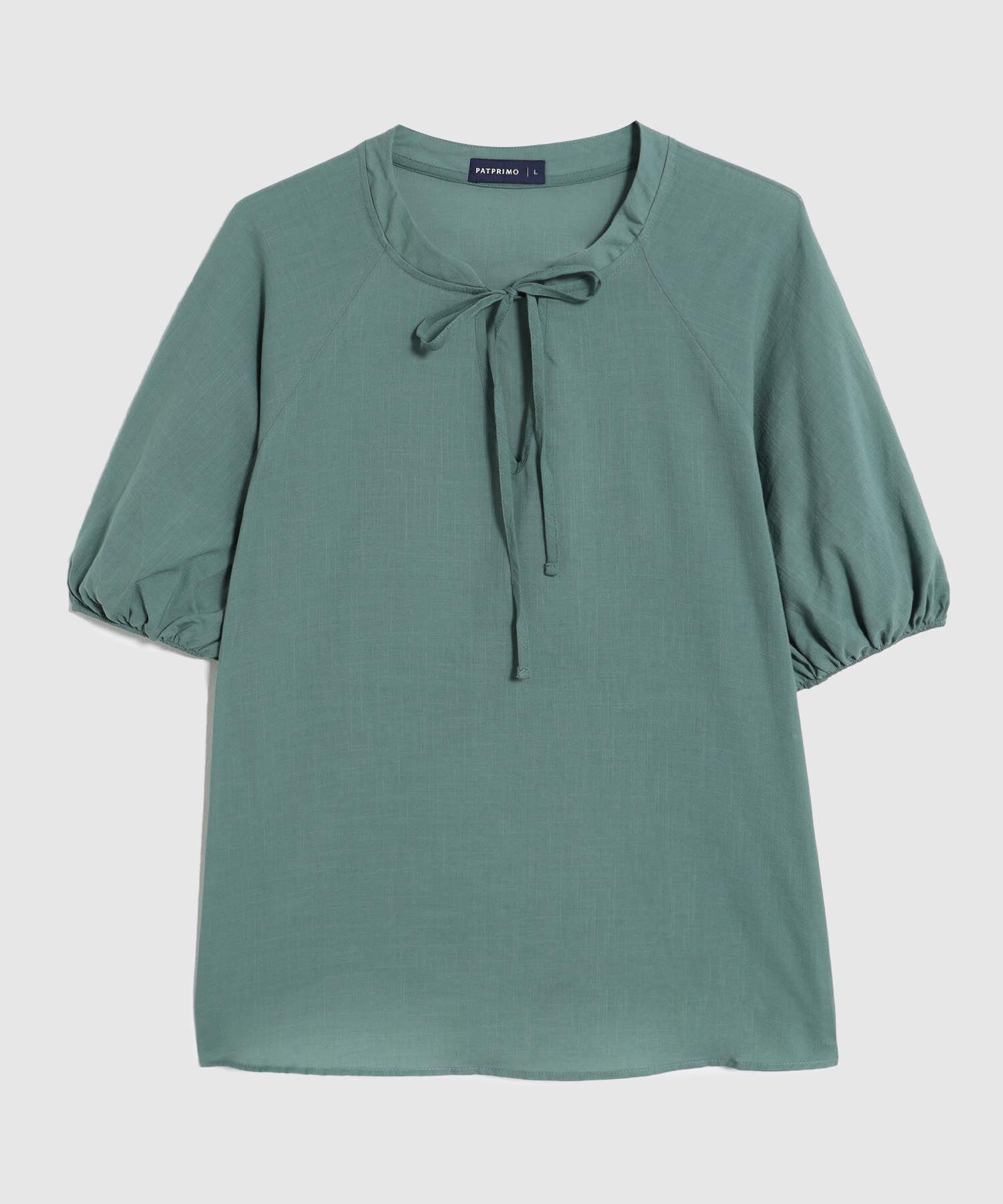 Blusa Unicolor Con Nudo En Cuello 